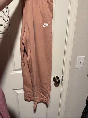 Nike Straight Leg Joggers in Dusty Rose with White Logo